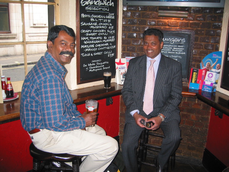 Babu Rajasabai enjoying a beer in a UK pub with Joseph Muthu( Batch of 1977) - March 2005