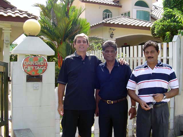 Outside Oakshott Cottage Chandra's new home in Ipoh with Glenn, Chandra and Sudesh - Dec 2006